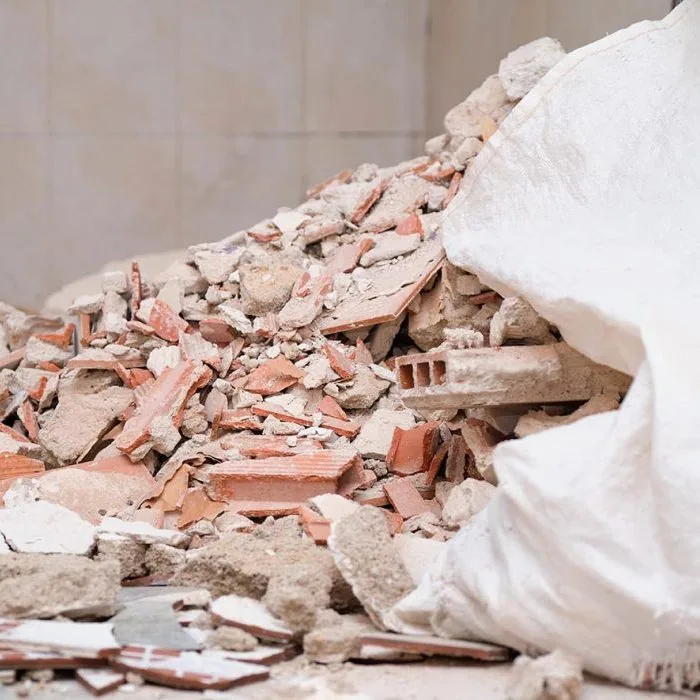 House debris at a construction site. Concrete and brick debris.