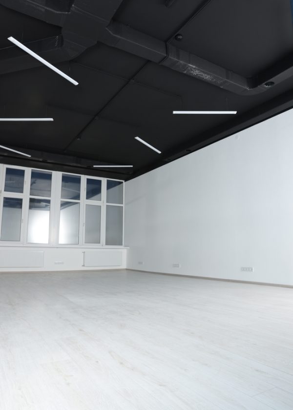 Empty,Office,Room,With,Black,Ceiling,And,Clean,Windows.,Interior
